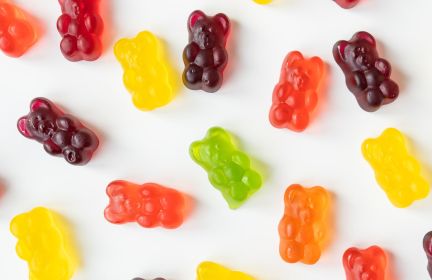 What are jelly beans made of and how are they produced?